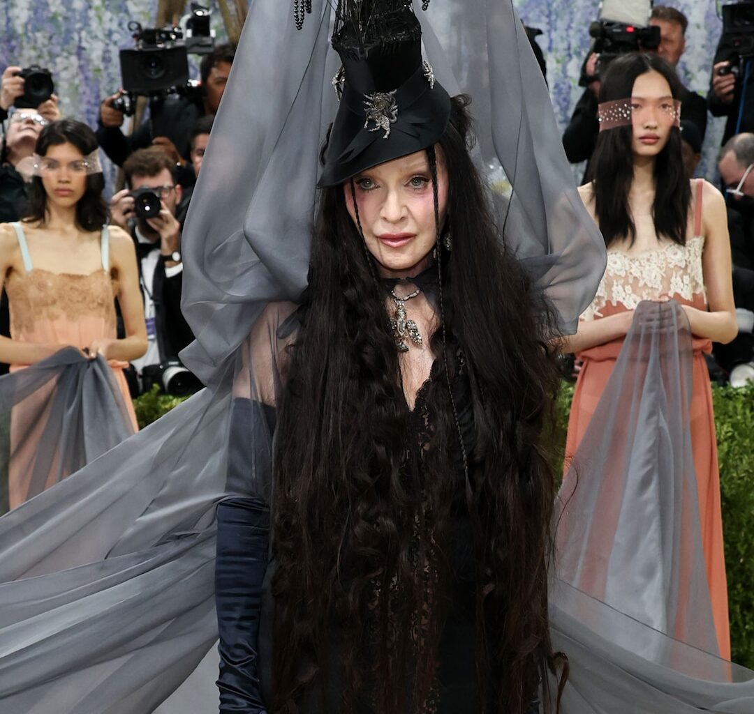 Madonna Uses 7 Helpers to Hold Up Dress