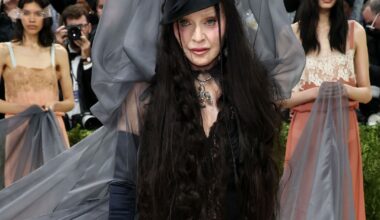 Madonna Uses 7 Helpers to Hold Up Dress