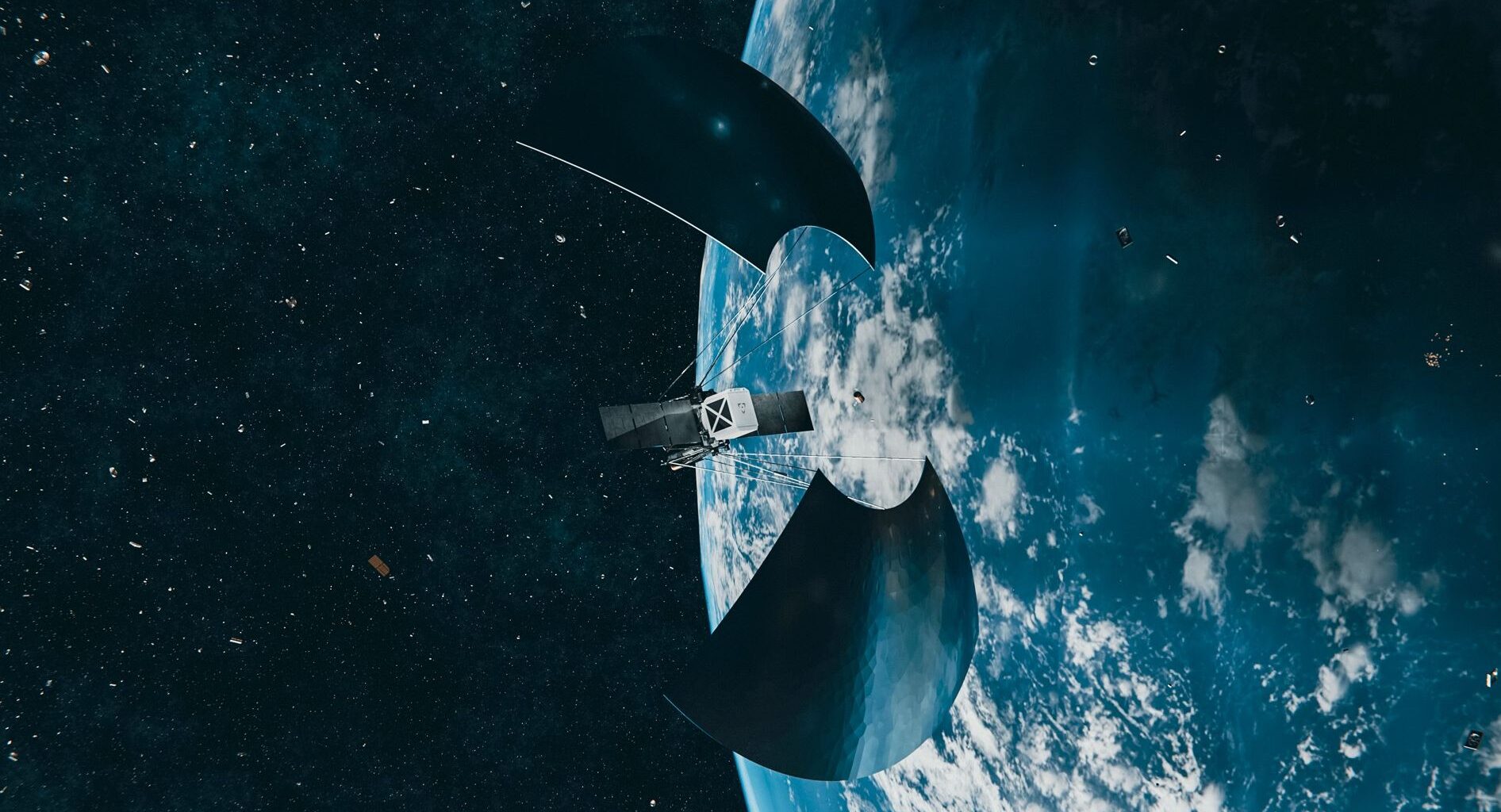 Artist's illustration of a spacecraft in earth orbit, with a number of small satellites below it