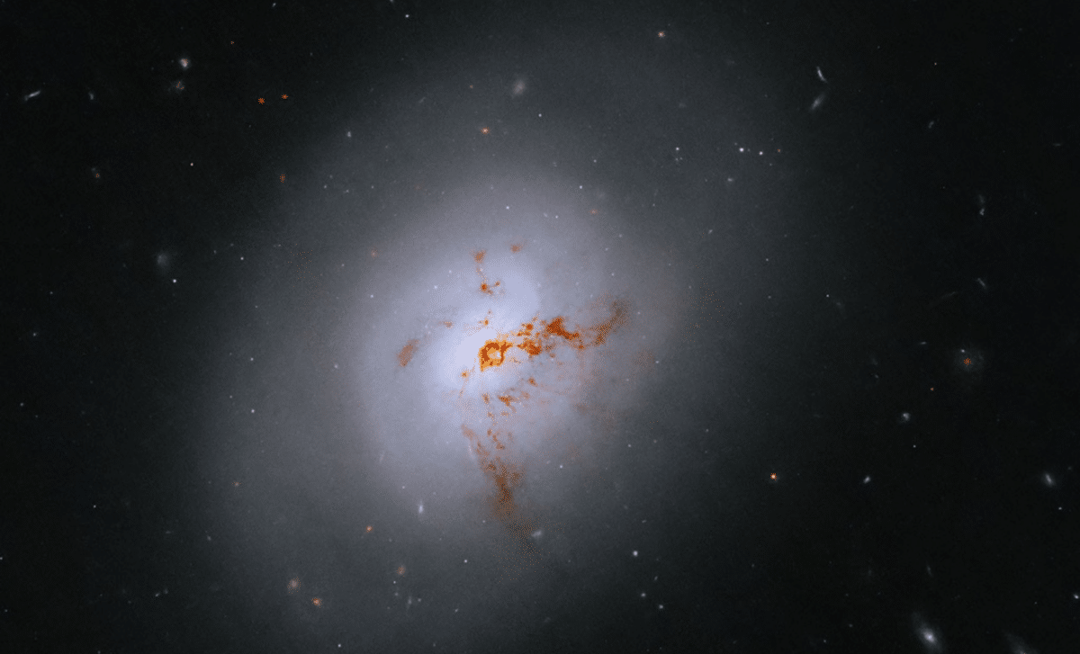 Hubble Captures Rare Galaxy Caught In Dramatic Evolutionary Shift Across Cosmic Time