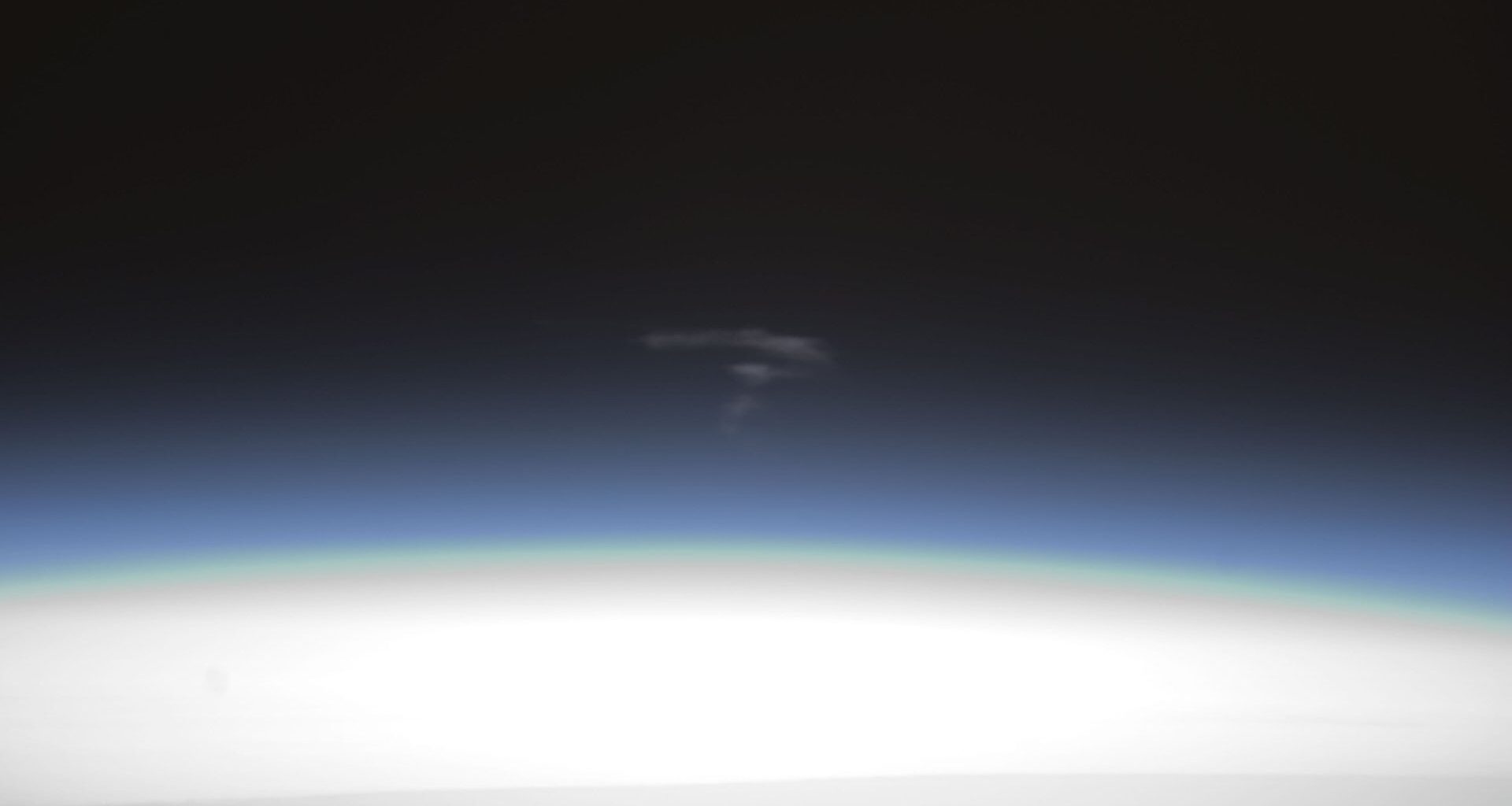 Atmospheric fallout from the destructive re-entry of the ATV-3 vehicle taken from the Expedition-33 mission. Credit - NASA