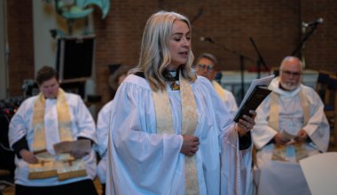 Reverend Emily Kolltveit singing a hymn