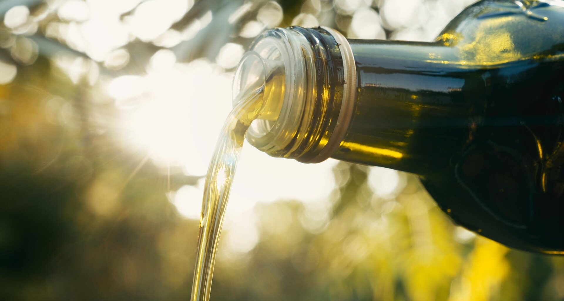 Pouring Olive Oil Bottle