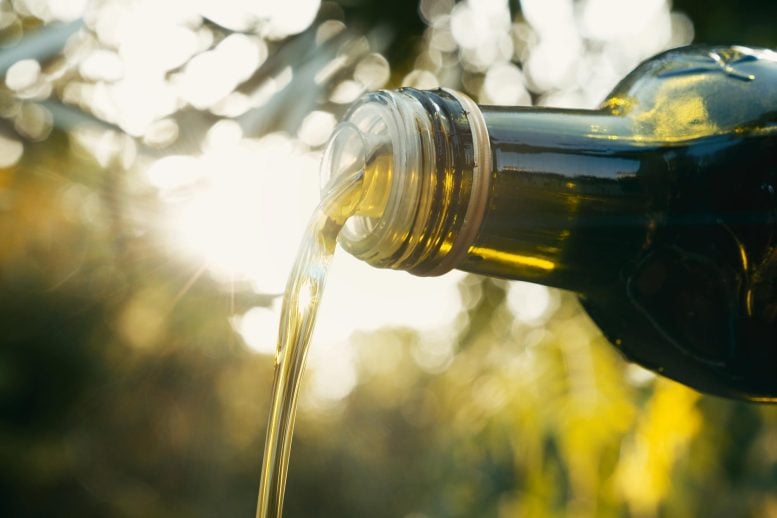Pouring Olive Oil Bottle