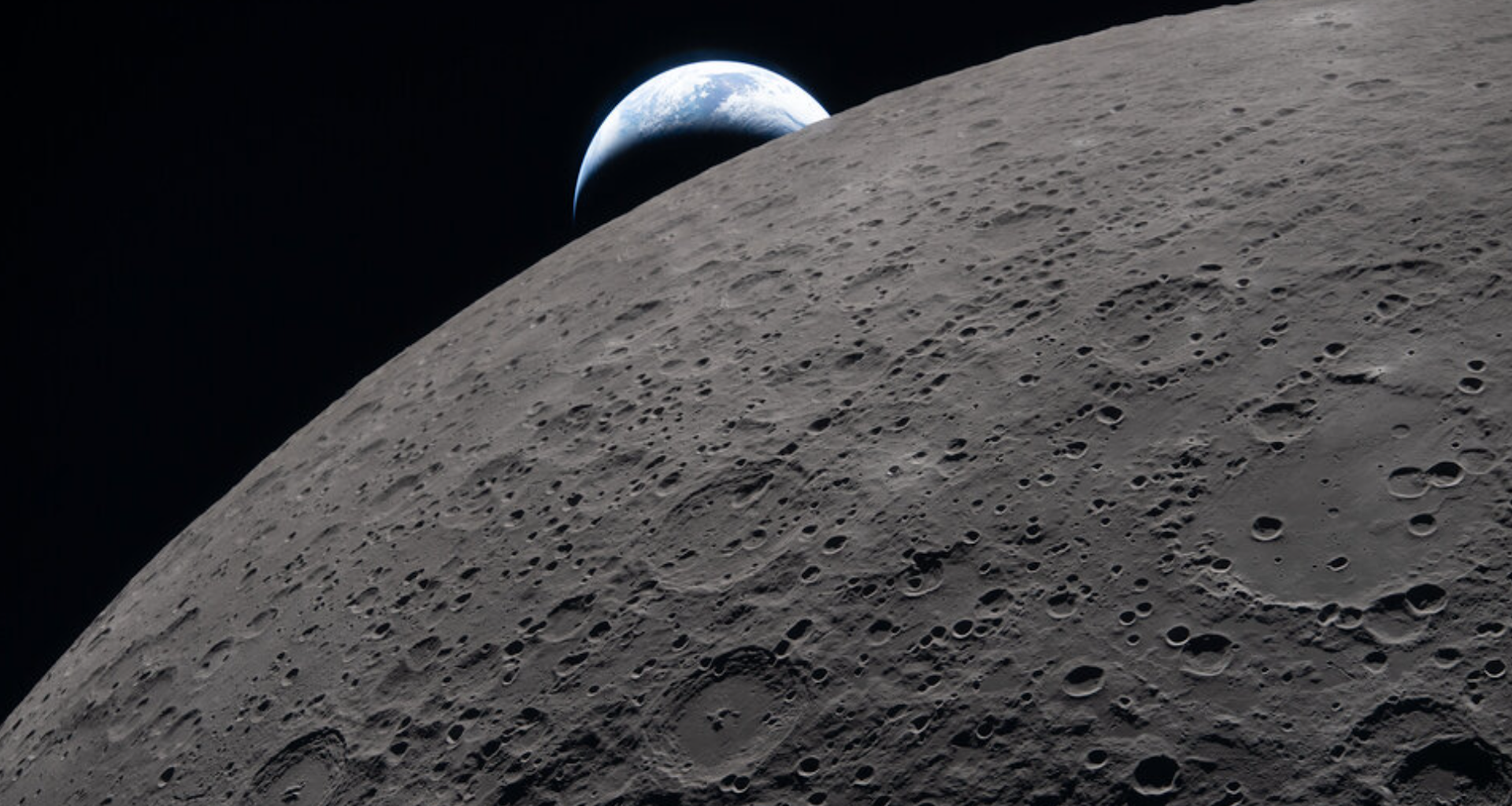an image of the Earth setting behind the moon