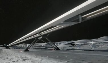 an elevated railroad-like structure on a grey dusty landscape