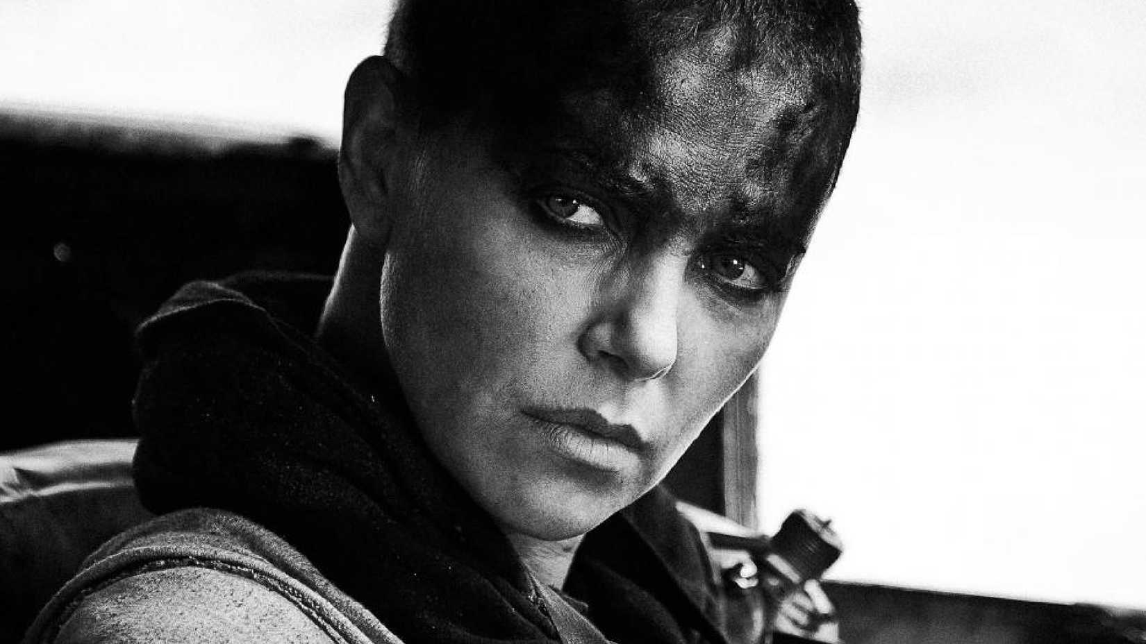 a still from mad max fury road black and chrome showing furiosa