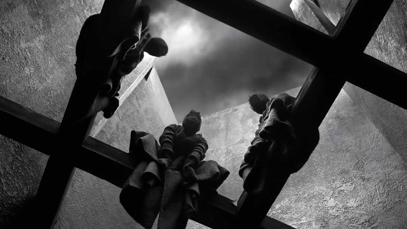a still from the tragedy of macbeth showing the witches