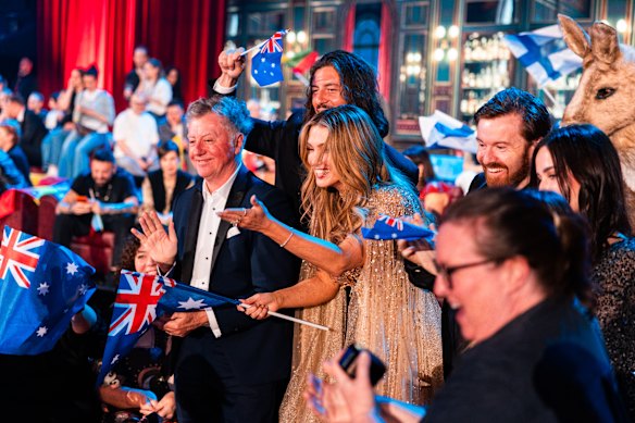 Australia’s Delta Goodrem and her team gather with other countries’ competitors in the green room after the Eurovision grand final.