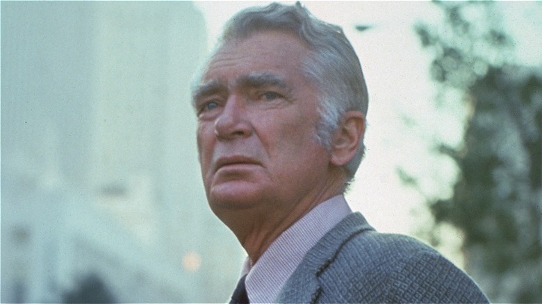 Barnaby Jones walks down the street in 