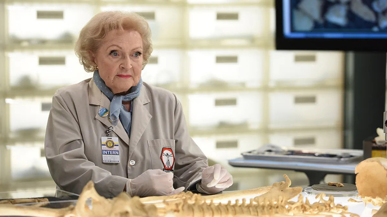 Betty White as Dr. Beth Mayer works on some bones in Bones