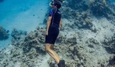A crocodile crushed his only functional arm. He returned to the to water to fight plastic pollution