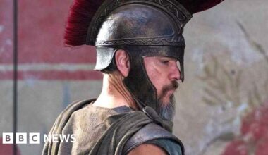 Odyssey trailer shows star Matt Damon heading home to rescue family - BBC