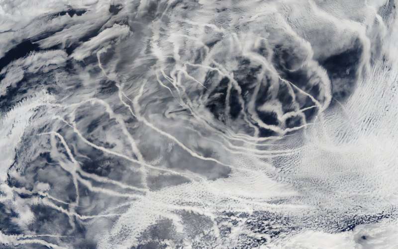 Sailboat "ship tracks" in a cloud—fine particles from ship exhaust seed extra droplets, making a bright streak of cloud over the Pacific (NASA MODIS) Clean Air, Thinner Clouds? A Century-Old Pollution Puzzle
