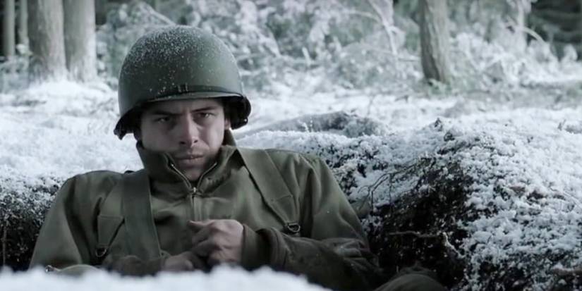 Eugene Roe (Shane Taylor) looking haunted in his foxhole during Episode 6 of 'Band of Brothers.'