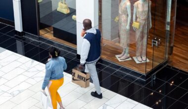 US consumer sentiment falls as Dow hits record