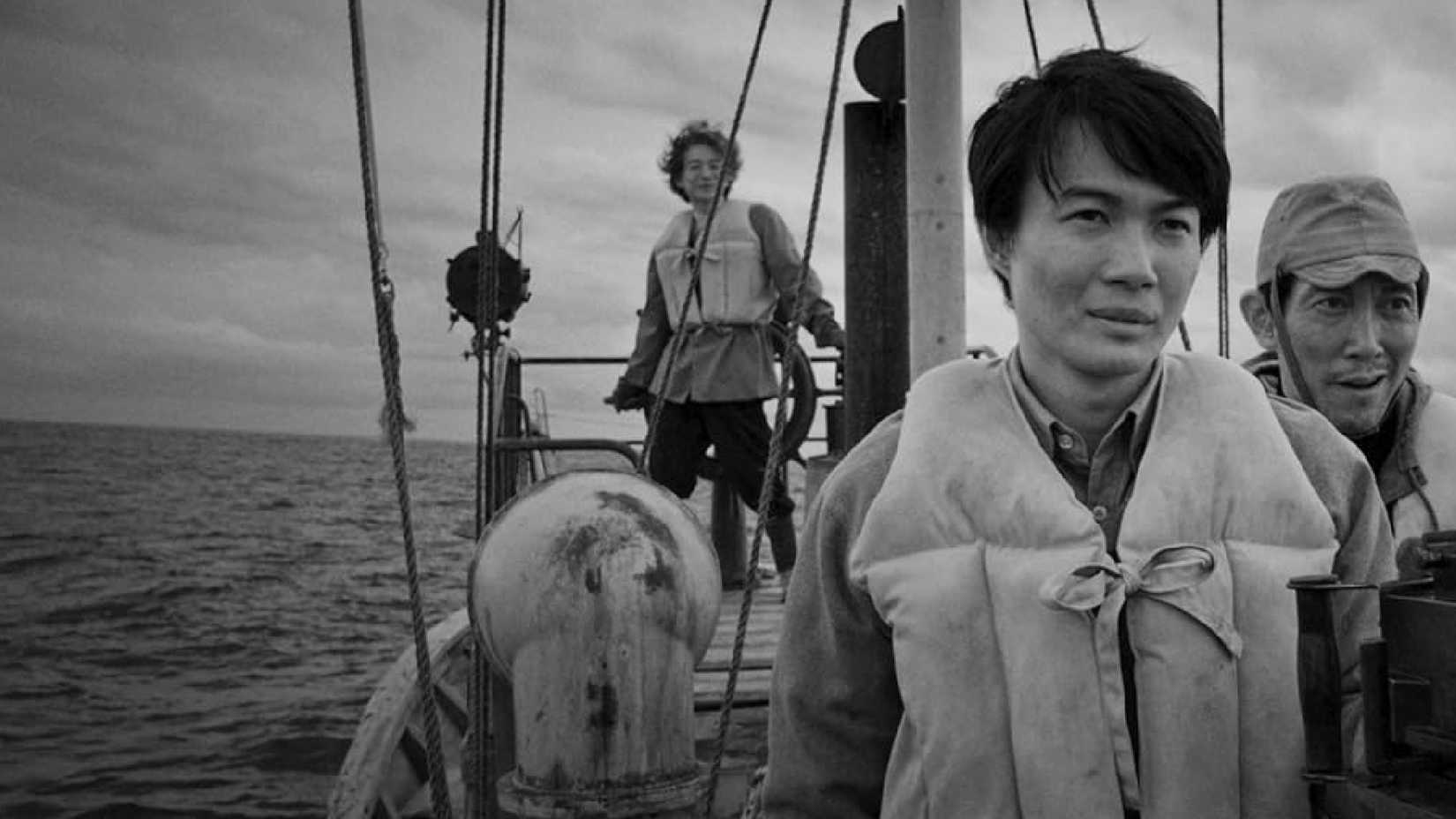 godzilla minus color still showing characters on a boat
