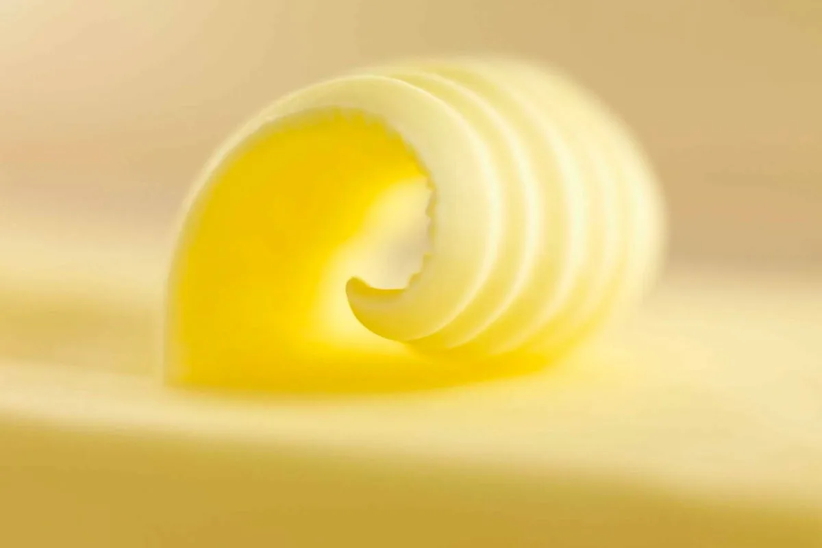 Close-up image of a 'wave' of a buttery spread