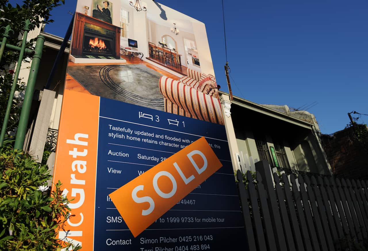 A house with a 'For Sale/Sold' sign in Sydney on Sunday, May 3, 2009. (AAP Image/Paul Miller) NO ARCHIVING