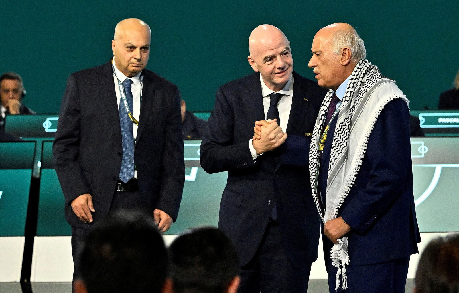 Palestinian football boss refuses Israeli handshake at FIFA event | Israel-Palestine conflict