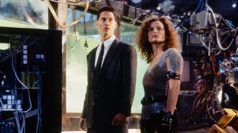 Keanu Reeves and Dina Meyer in Johnny Mnemonic