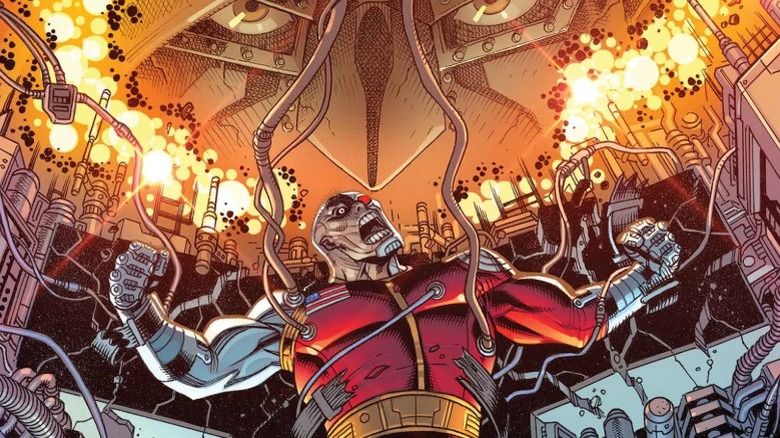 Deathlok tearing loose from cables as Doom hovers on the cover of Deathlok Anniversary #1