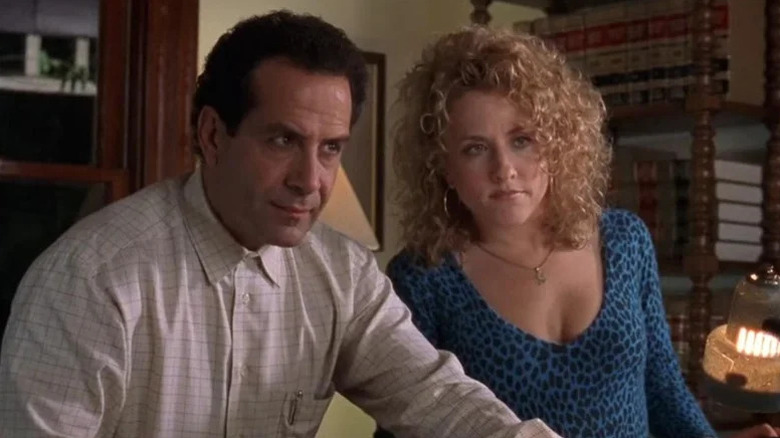 Tony Shalhoub as Monk standing next to Bitty Schram as Sharona Fleming in Monk