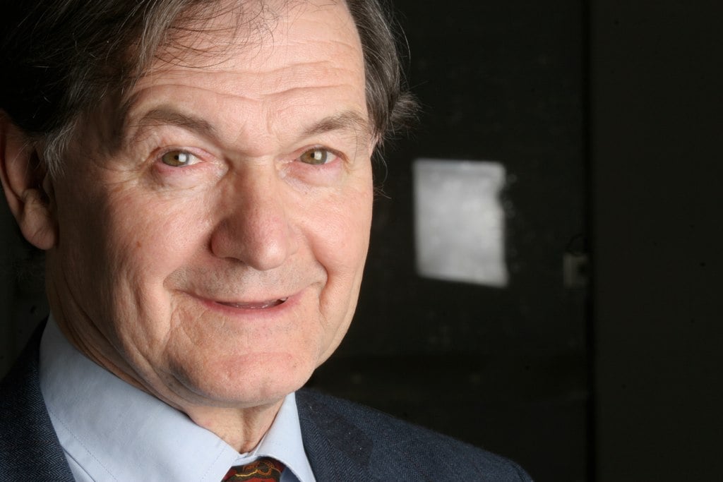 Roger Penrose, who pointed out that Hawking's prediction of a smooth, low-entropy early universe was less a prediction than an assumption baked in from the start. (CC BY-SA 2.0, Solarflare100 / Wikimedia Commons)
