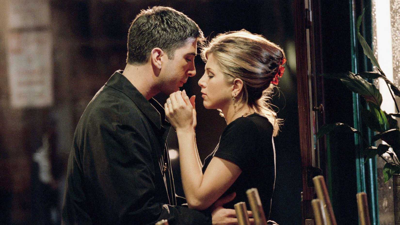 Ross and Rachel about to kiss in Friends.