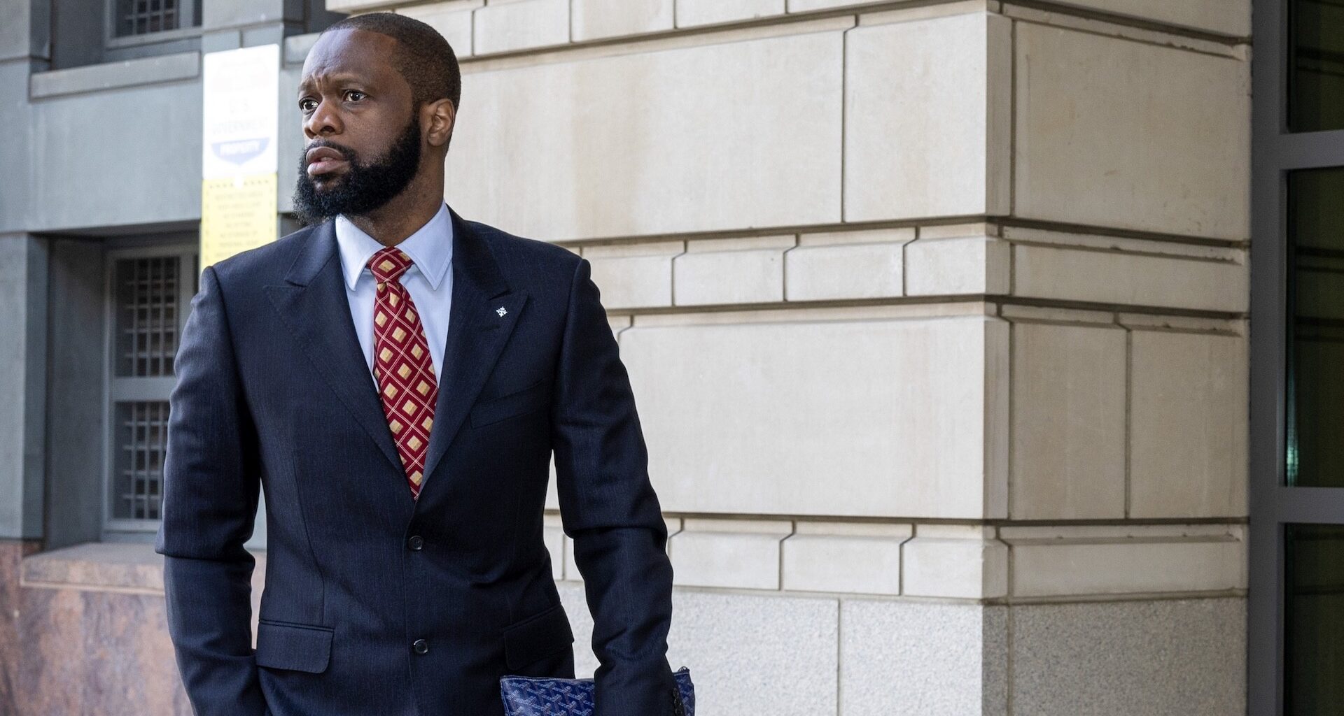 WASHINGTON, DC - APRIL 03: Pras Michel, a member of the 1990's hip-hop group the Fugees, arrives at U.S. District Court on April 3, 2023 in Washington, DC. Michel is on trial for his alleged participation in a campaign finance conspiracy.