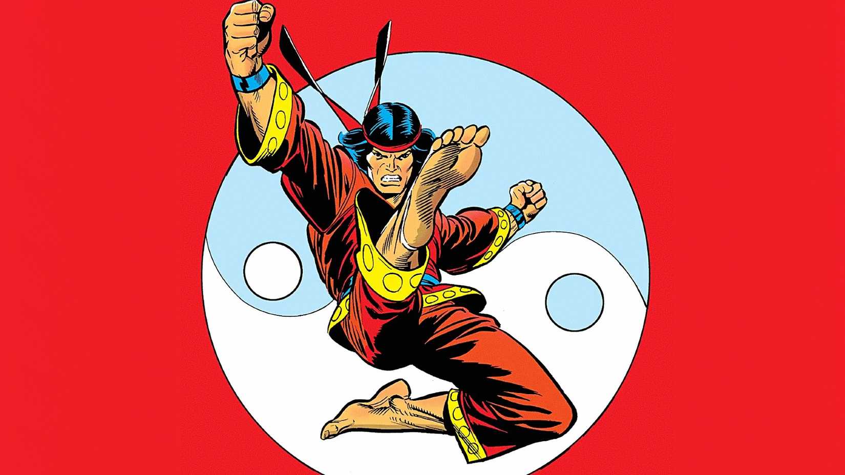 Shang-Chi Master of Kung Fu kicks in front of a yin yang symbol in Marvel Comics