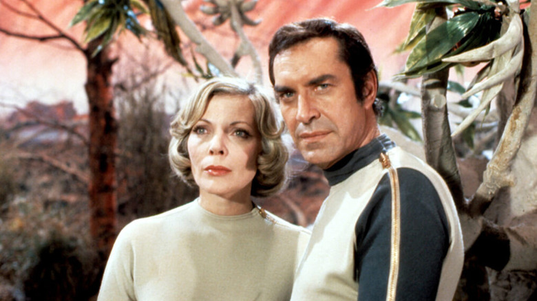 Dr. Helena Russell and Commander John Koenig frowning in 
