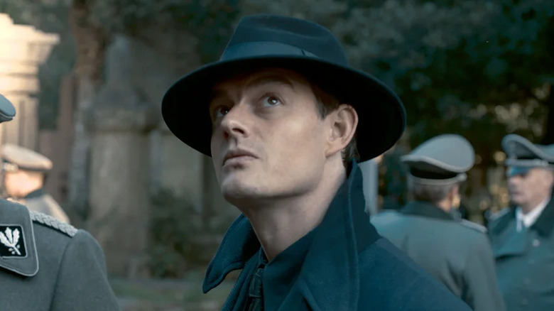 Sam Riley as Detective Superintendent Douglas Archer, looking upward in SS-GB.