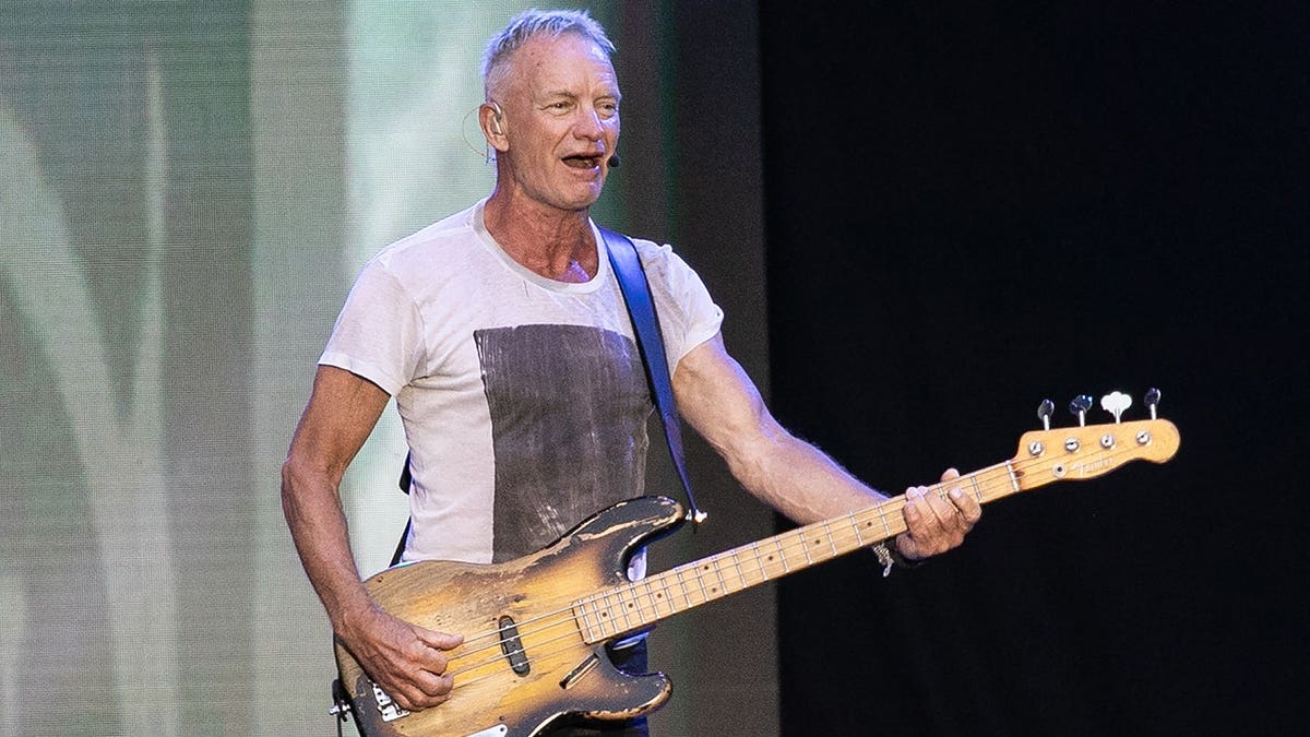 Sting performing on stage at Cardiff Castle in Wales in June 2025.
