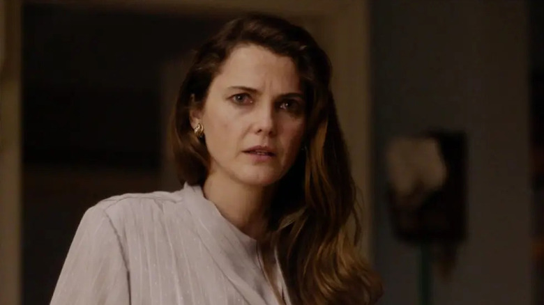 A visibly distraught Elizabeth Jennings stares in shock