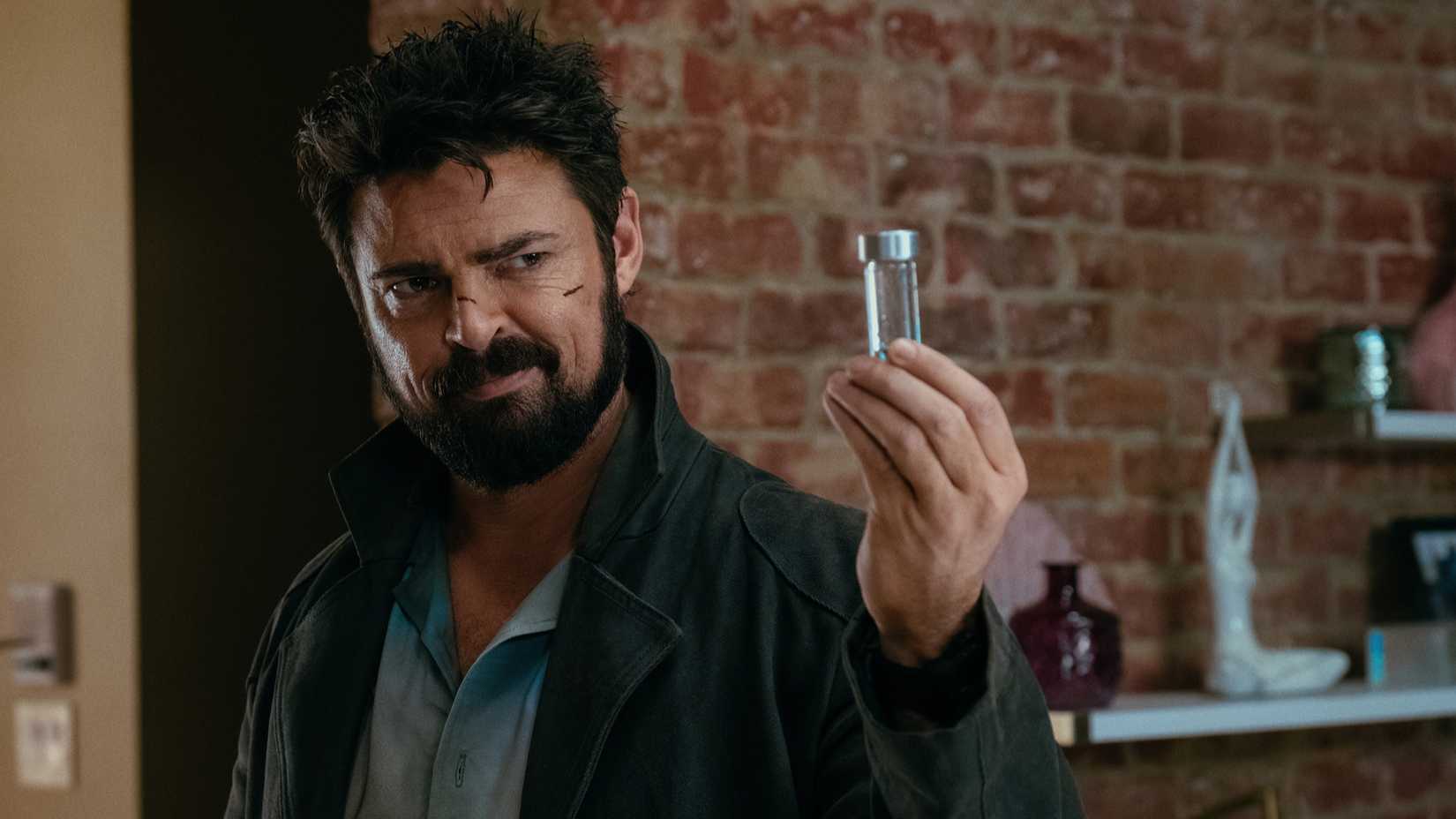 Billy holding up a vial in The Boys