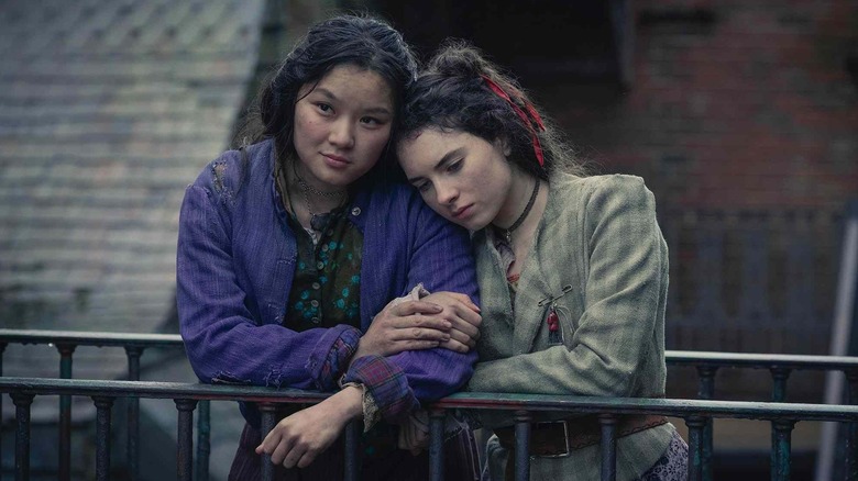 Bea (Thaddea Graham) comforts Jessie (Darci Shaw) in The Irregulars