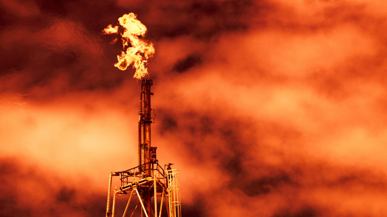 A flare tower burning off excess methane gas