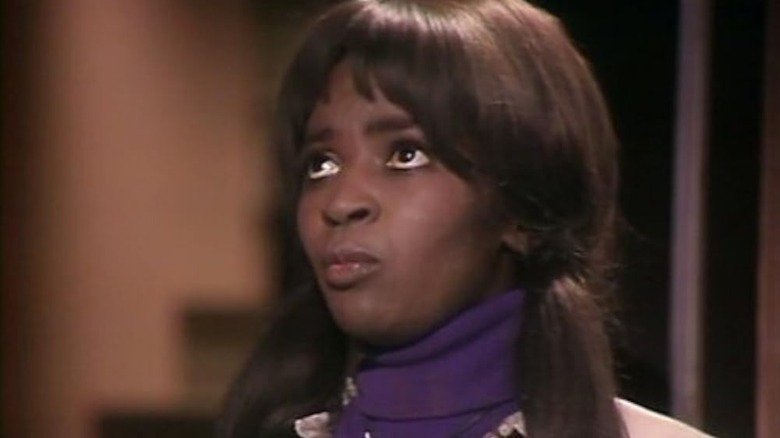 Elizabeth frowning in 