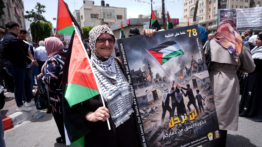 Palestinians march carrying flags and symbolic keys representing the right of return during a demonstration marking the 78th anniversary of the Nakba in Ramallah, West Bank, Palestine, on May 12, 2026.