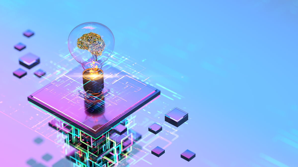 A light bulb rests on top of a purple AI chip.