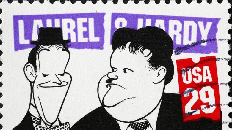 A caricature stamp of Laurel and Hardy