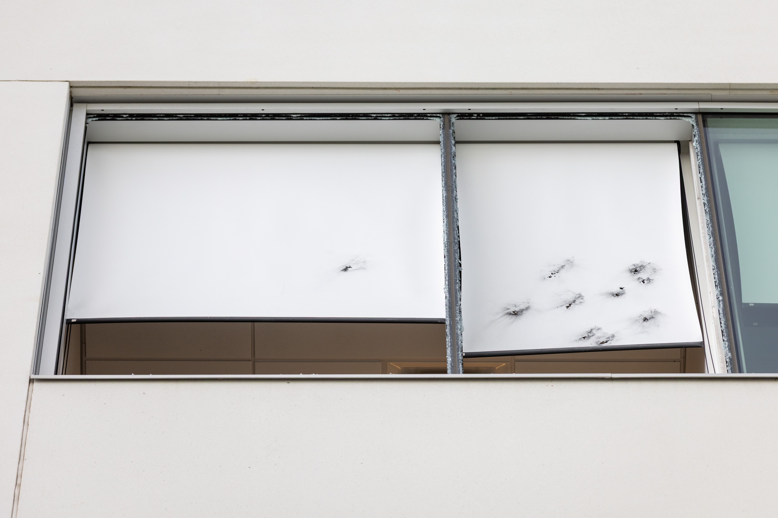 Bullet holes in curtains 