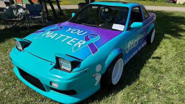 Fort St. John couple driving teal and purple car to destigmatize mental health, prevent suicide