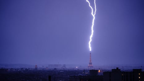 Lightning bolts strike Eiffel Tower during Paris thunderstorm – video