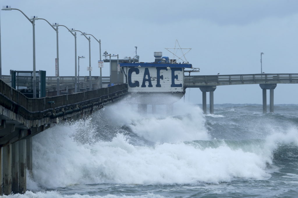 A pedestrian pier closed by authorities due to high surf from an El Nino-strengthened storm is pictured in Ocean Beach
