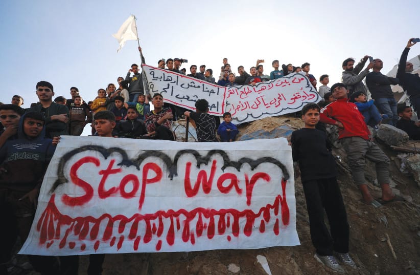 [FILE PHOTO] PALESTINIANS DEMAND an end to war, chanting anti-Hamas slogans, in Beit Lahiya in the northern Gaza Strip.