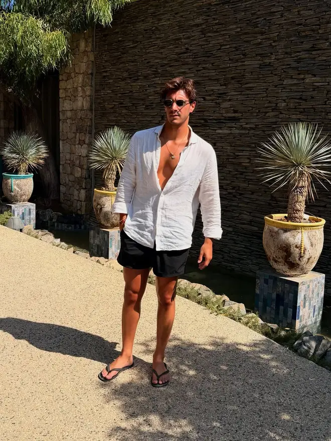 Love Island's Lorenzo pictured posing on holiday.