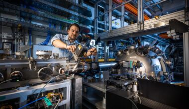 Laser strums atoms trillions of times in search for better computers