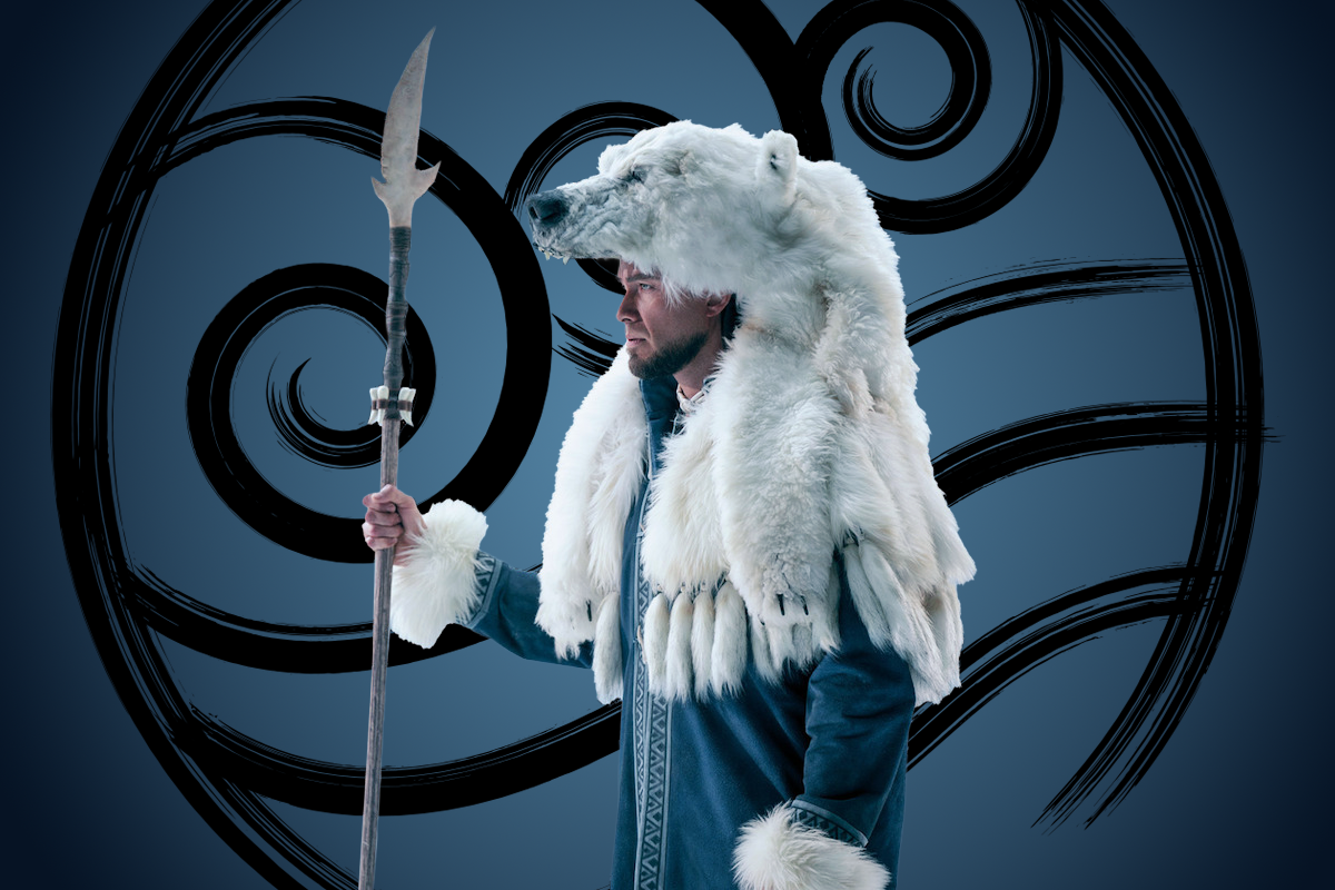 Meegwun Fairbrother as Avatar Kuruk in a blue robe and bear fur headdress holds a spear, standing before a stylized wave pattern on a blue background, evoking a winter or polar tribal setting.